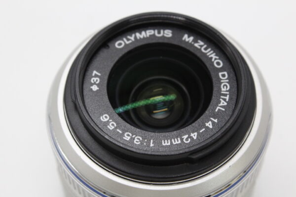 【良品】OLYMPUS オリンパス 標準ズームレンズ M.ZUIKO DIGITAL 14-42mm F3.5-5.6 II シルバー #LE20252012 - 画像 (7)